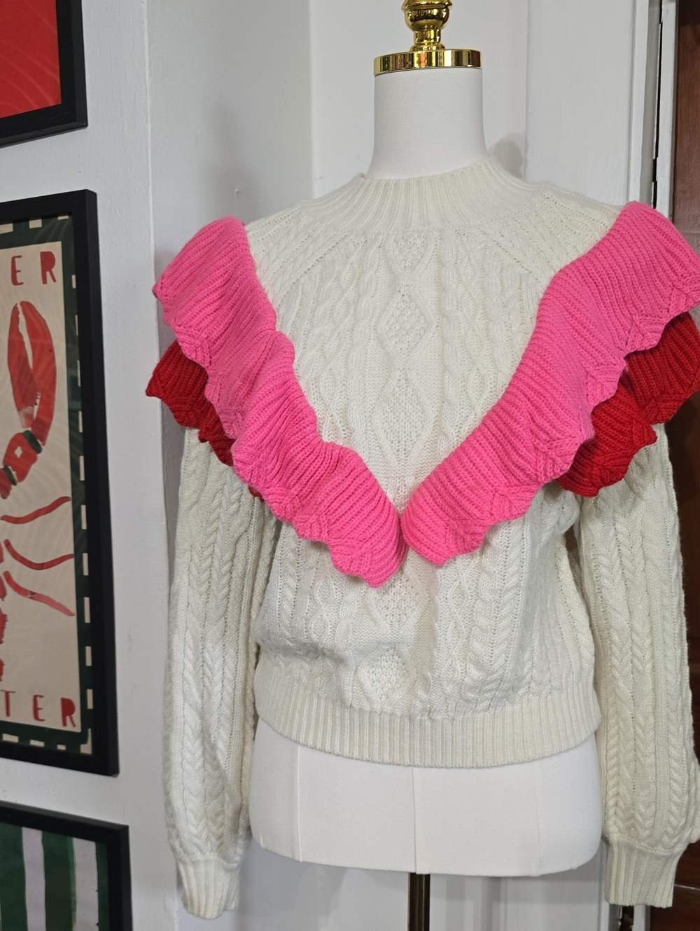 Women’s Cream Cable-Knit Sweater with Pink & Red Ruffle Trim Strut And Bolt